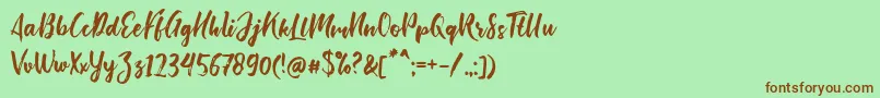 Fonte Bishella Script – fontes marrons em um fundo verde