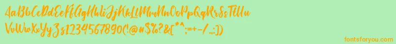 Bishella Script-Schriftart – Orangefarbene Schriften auf grünem Hintergrund