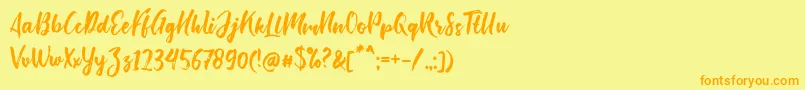 Fonte Bishella Script – fontes laranjas em um fundo amarelo