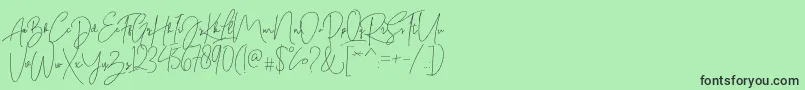 フォントBitlamero Script – 緑の背景に黒い文字