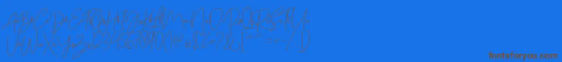 Bitlamero Script-Schriftart – Braune Schriften auf blauem Hintergrund