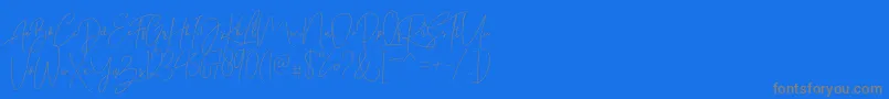 Bitlamero Script-Schriftart – Graue Schriften auf blauem Hintergrund