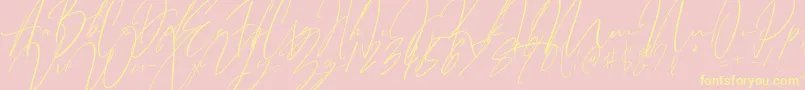 フォントBitter Mind – 黄色のフォント、ピンクの背景