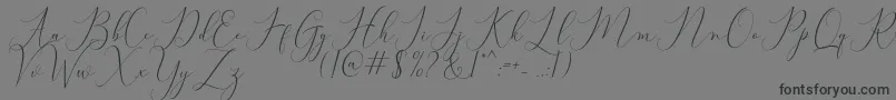 Bitthai Script-Schriftart – Schwarze Schriften auf grauem Hintergrund
