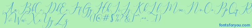 Bitthai Script-Schriftart – Blaue Schriften auf grünem Hintergrund