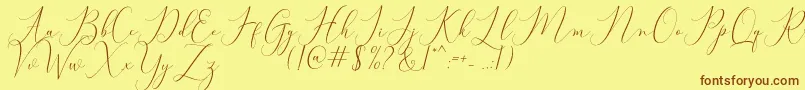 Bitthai Script-fontti – ruskeat fontit keltaisella taustalla