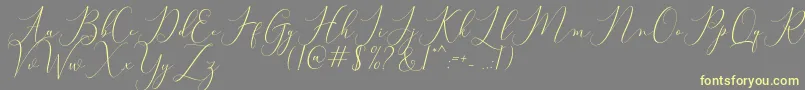 Bitthai Script-fontti – keltaiset fontit harmaalla taustalla