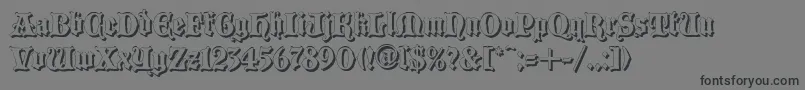 BLACCS  -Schriftart – Schwarze Schriften auf grauem Hintergrund
