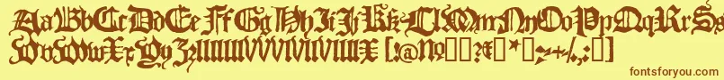 フォントBLACH    – 茶色の文字が黄色の背景にあります。