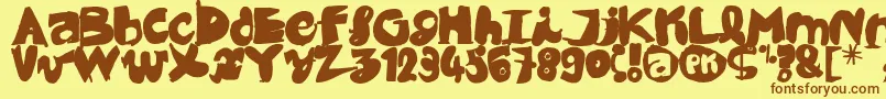 フォントBlack CoBrA – 茶色の文字が黄色の背景にあります。