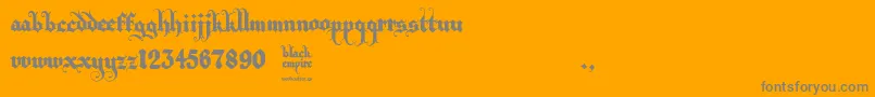 Black Empire-Schriftart – Graue Schriften auf orangefarbenem Hintergrund