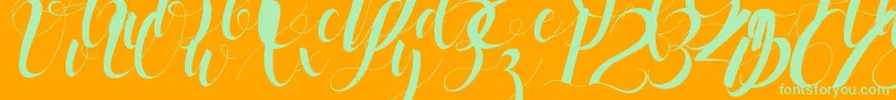 black stud-Schriftart – Grüne Schriften auf orangefarbenem Hintergrund