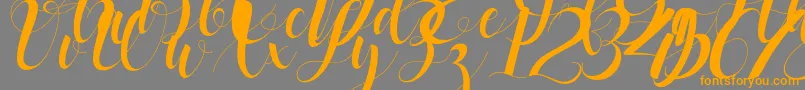 black stud Font – Orange Fonts on Gray Background