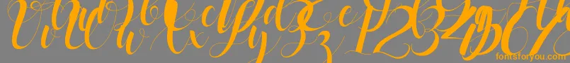 black stud Font – Orange Fonts on Gray Background