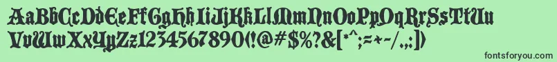 BlackCastleMF Font – Black Fonts on Green Background