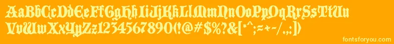 BlackCastleMF Font – Yellow Fonts on Orange Background