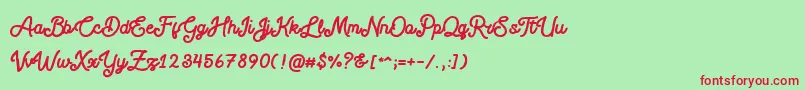 フォントBlackcode Script Stamp Free Personal Use – 赤い文字の緑の背景