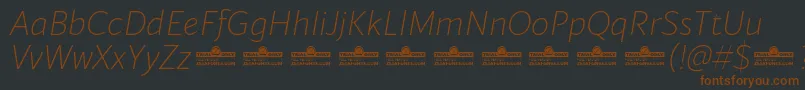 fuente Blacker Sans Extralight Italic trial – Fuentes Marrones Sobre Fondo Negro
