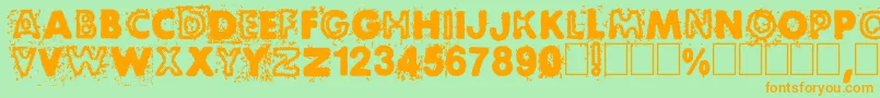 BlackNdot Font – Orange Fonts on Green Background