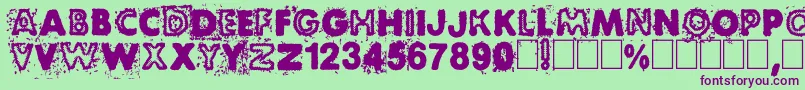 BlackNdot Font – Purple Fonts on Green Background