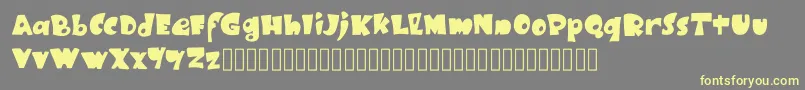 BlackRubyOne Font – Yellow Fonts on Gray Background