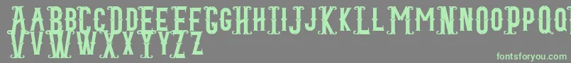 Blacktail Regular Font – Green Fonts on Gray Background