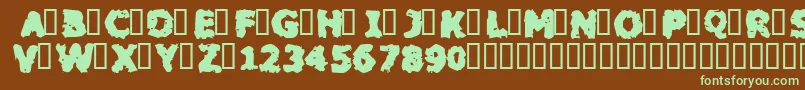 フォントBLACM    – 緑色の文字が茶色の背景にあります。