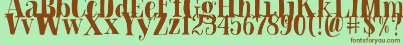 Blade Hallowen Font Font – Brown Fonts on Green Background