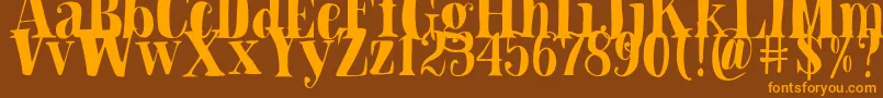 フォントBlade Hallowen Font – オレンジ色の文字が茶色の背景にあります。