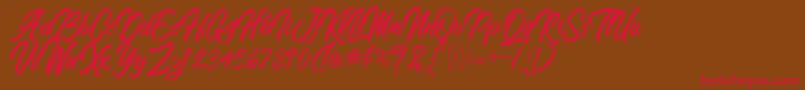 BlangkonScript Font – Red Fonts on Brown Background