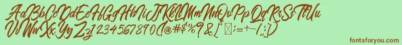 Fonte BlangkonScript – fontes marrons em um fundo verde