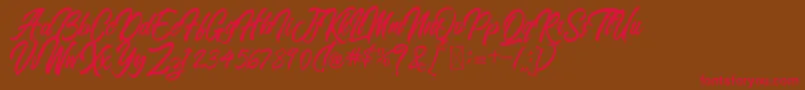 BlangkonScript Font – Red Fonts on Brown Background