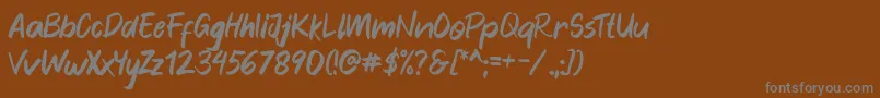 Blankers-Schriftart – Graue Schriften auf braunem Hintergrund