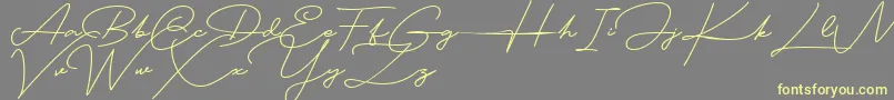 Blankid Font – Yellow Fonts on Gray Background