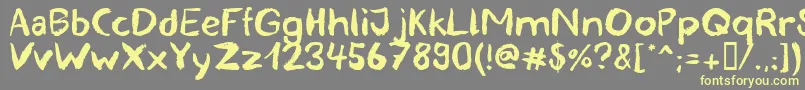 blemished Font – Yellow Fonts on Gray Background