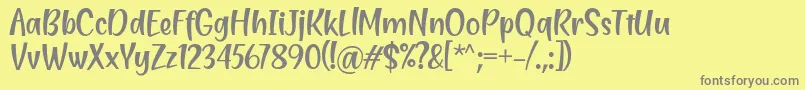 Czcionka Blending Attraction Regular Font by Situjuh 7NTypes – szare czcionki na żółtym tle