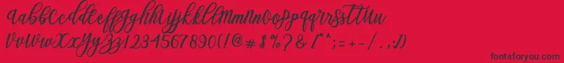 Blessed Script-Schriftart – Schwarze Schriften auf rotem Hintergrund