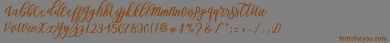 Blessed Script Font – Brown Fonts on Gray Background