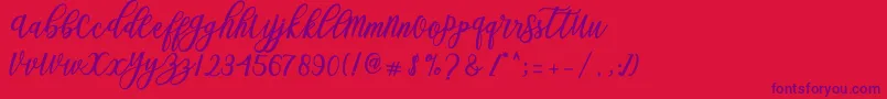 Blessed Script Font – Purple Fonts on Red Background