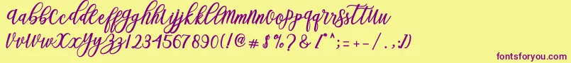 Czcionka Blessed Script – fioletowe czcionki na żółtym tle