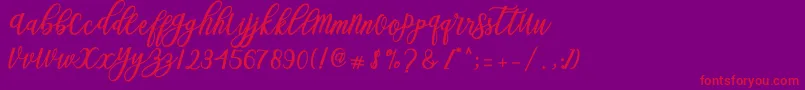 Blessed Script Font – Red Fonts on Purple Background