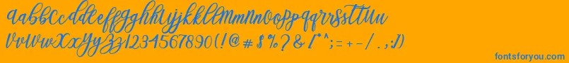 Czcionka Blessed Script – niebieskie czcionki na pomarańczowym tle