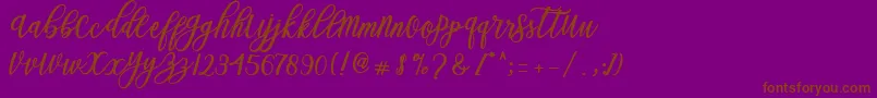 Fonte Blessed Script – fontes marrons em um fundo roxo