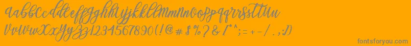 Weitere Informationen zur Blessed Script-Schriftart Blessed Script-Schriftart – Graue Schriften auf orangefarbenem Hintergrund