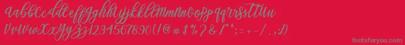 Blessed Script Font – Gray Fonts on Red Background