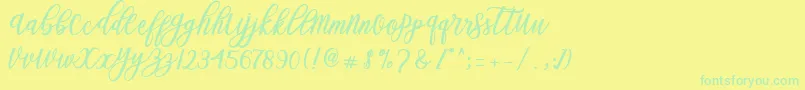 Blessed Script Font – Green Fonts on Yellow Background