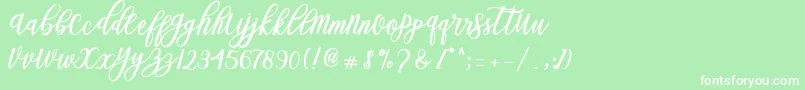 Blessed Script Font – White Fonts on Green Background