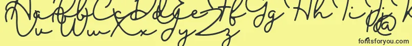Blesson Font – Black Fonts on Yellow Background