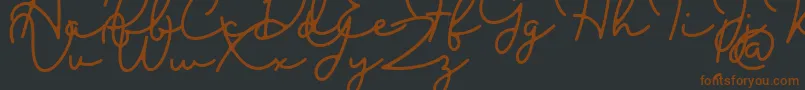 Blesson-fontti – ruskeat fontit mustalla taustalla