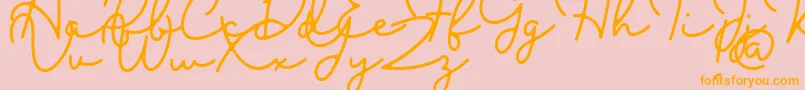 Blesson Font – Orange Fonts on Pink Background